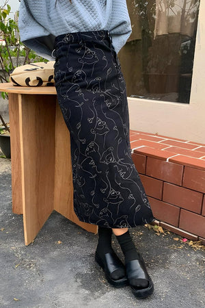 Abstract Faces Denim Midi Skirt